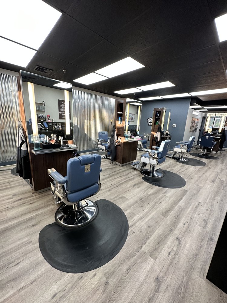 Inside Jimmy C's Barber Shop in Manchester NJ — barber chairs and stations