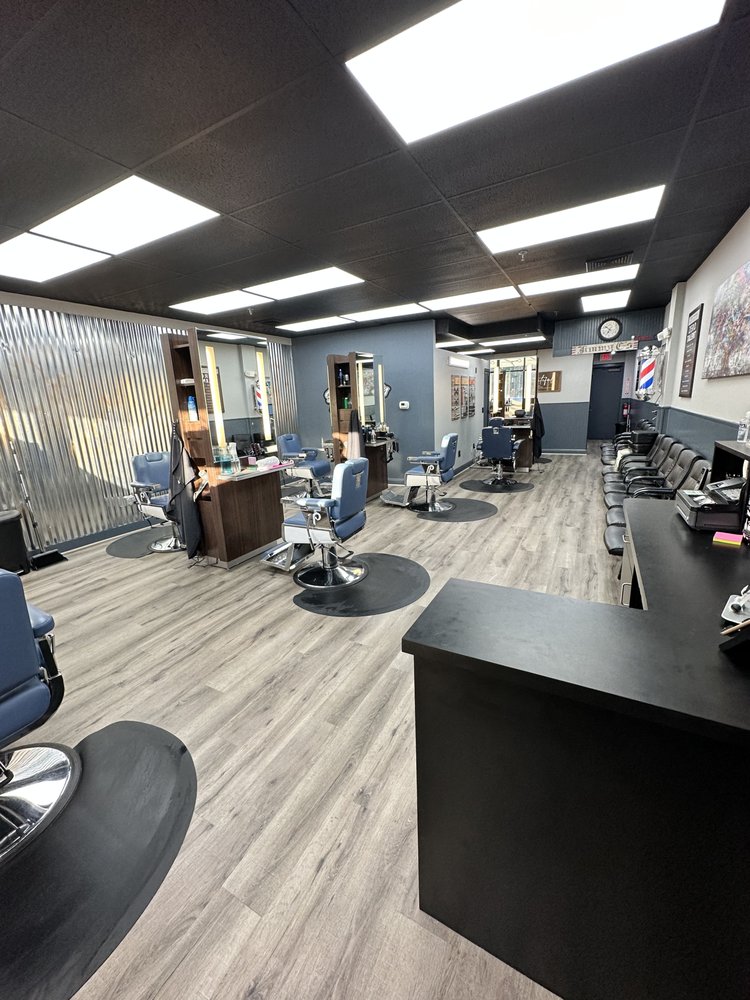 Front counter and waiting area at Jimmy C's Barber Shop